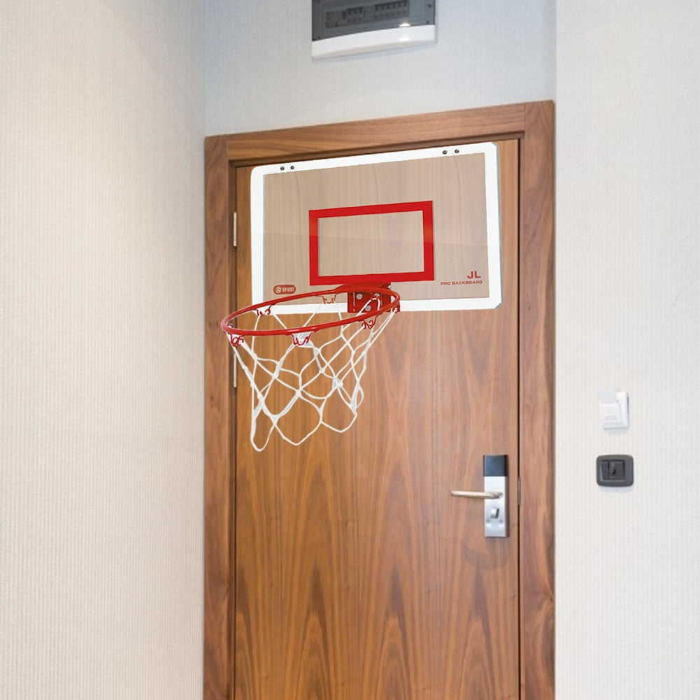 Child Hanging Basketball Hoop