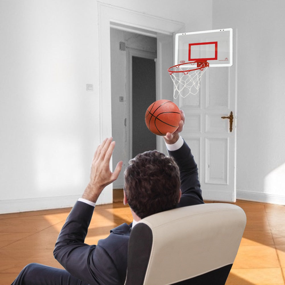 Child Hanging Basketball Hoop