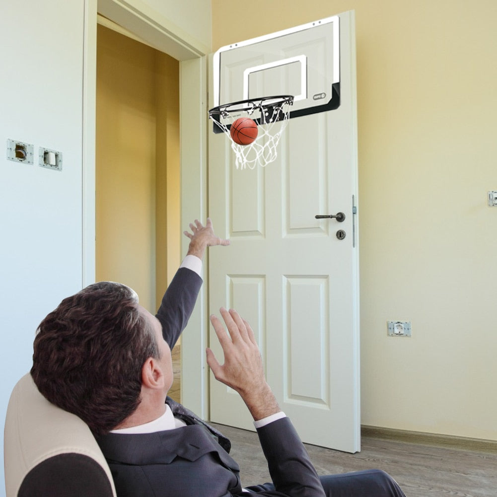 Child Hanging Basketball Hoop