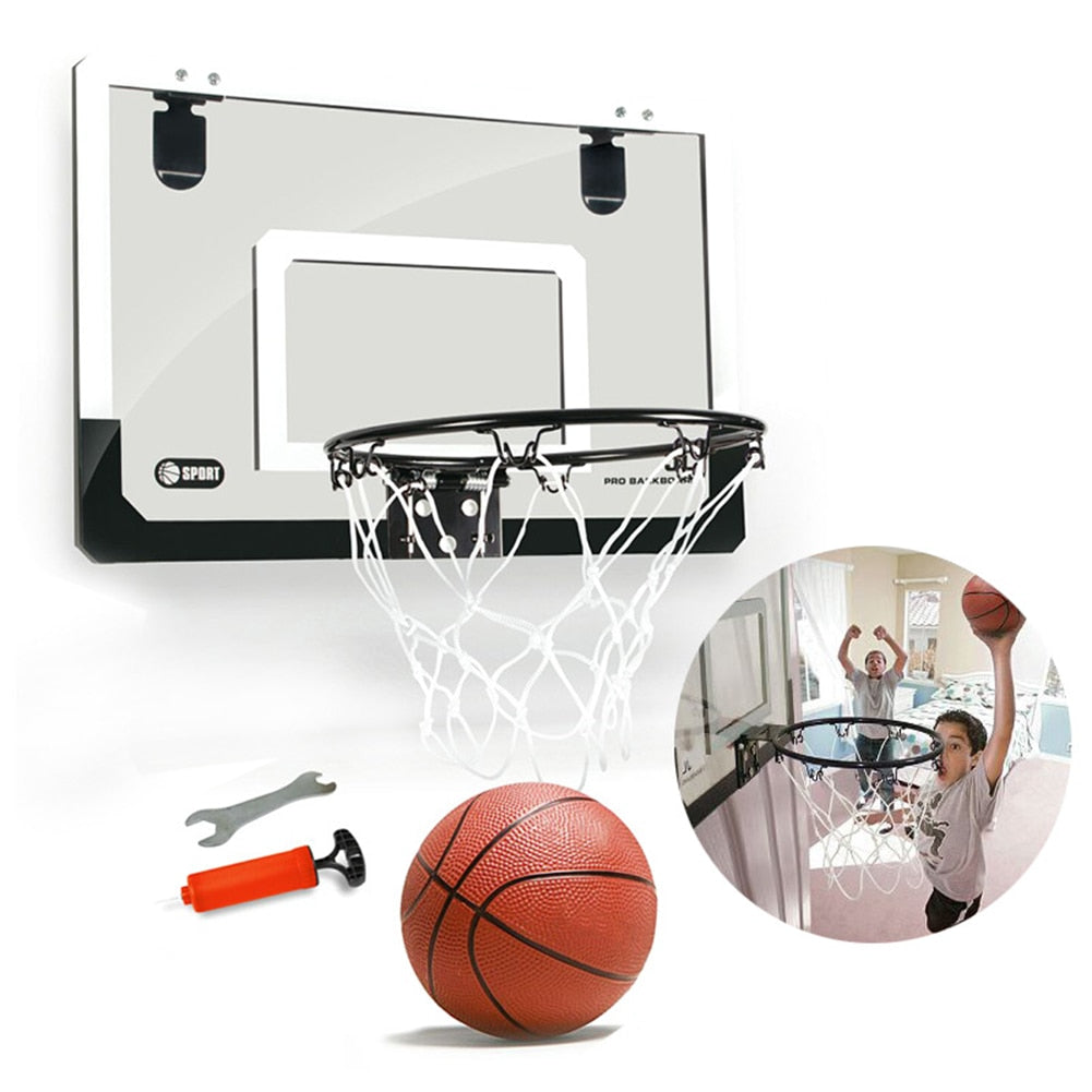 Child Hanging Basketball Hoop